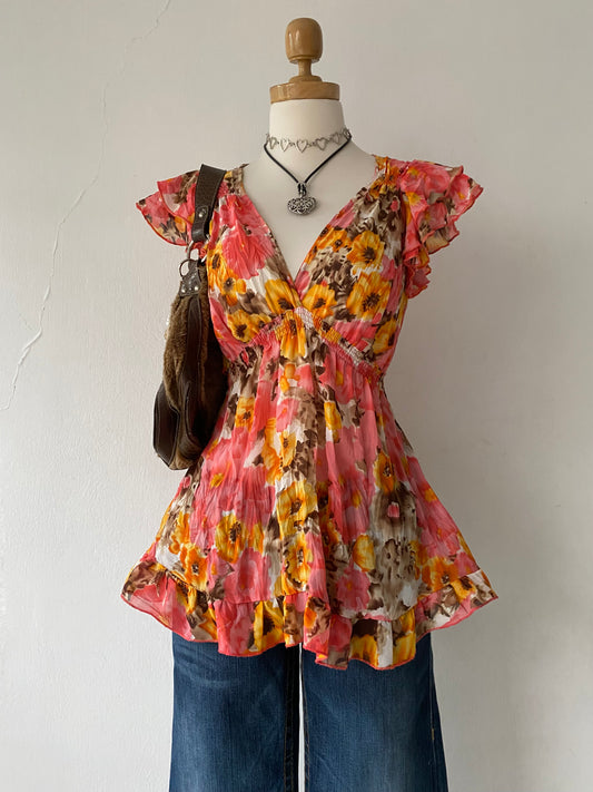 Adorable floral blouse with back bow