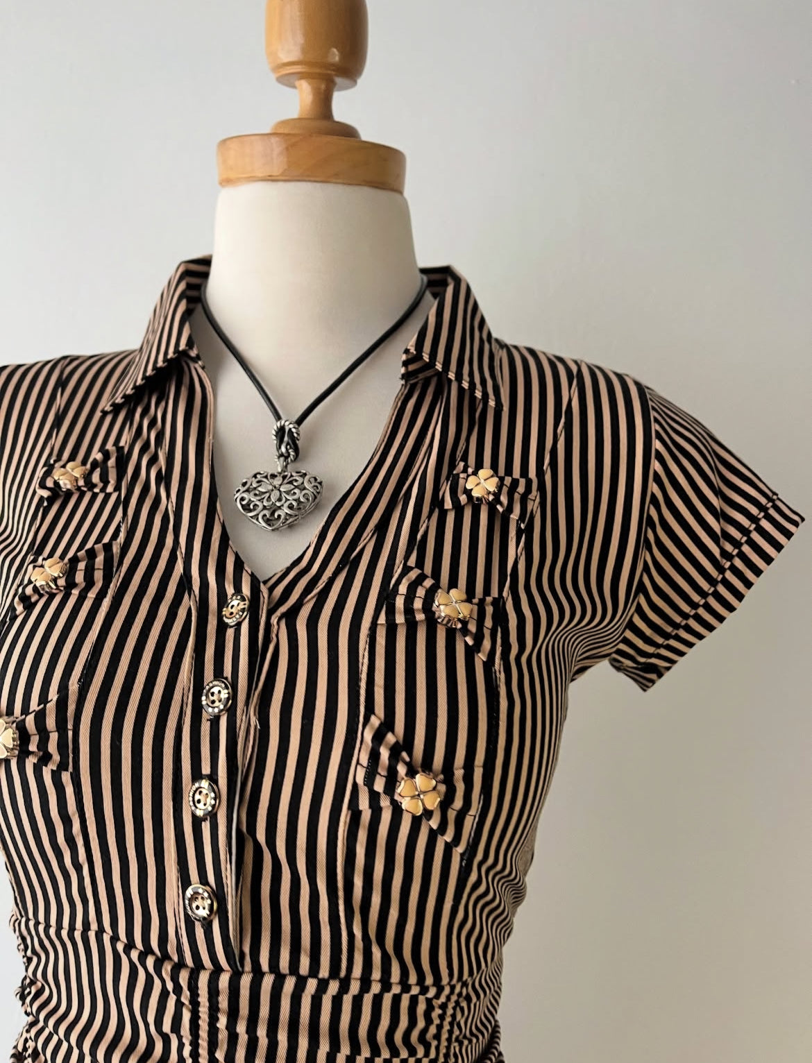 Striped blouse with bows