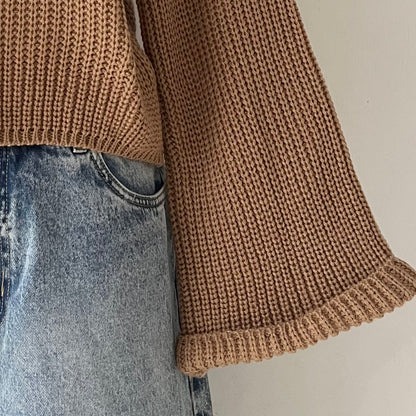 high-neck sweater with wide sleeves