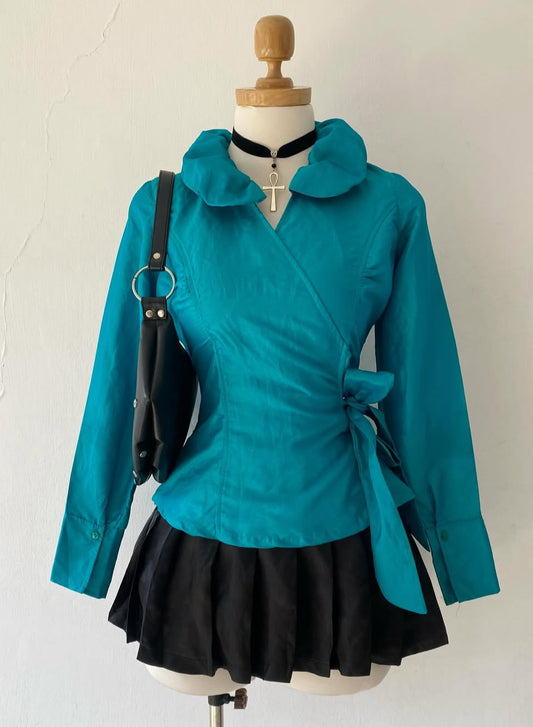Turquoise blouse with bow