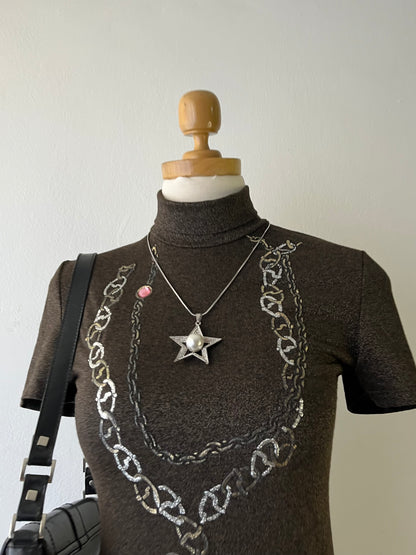 Iconic iridescent top