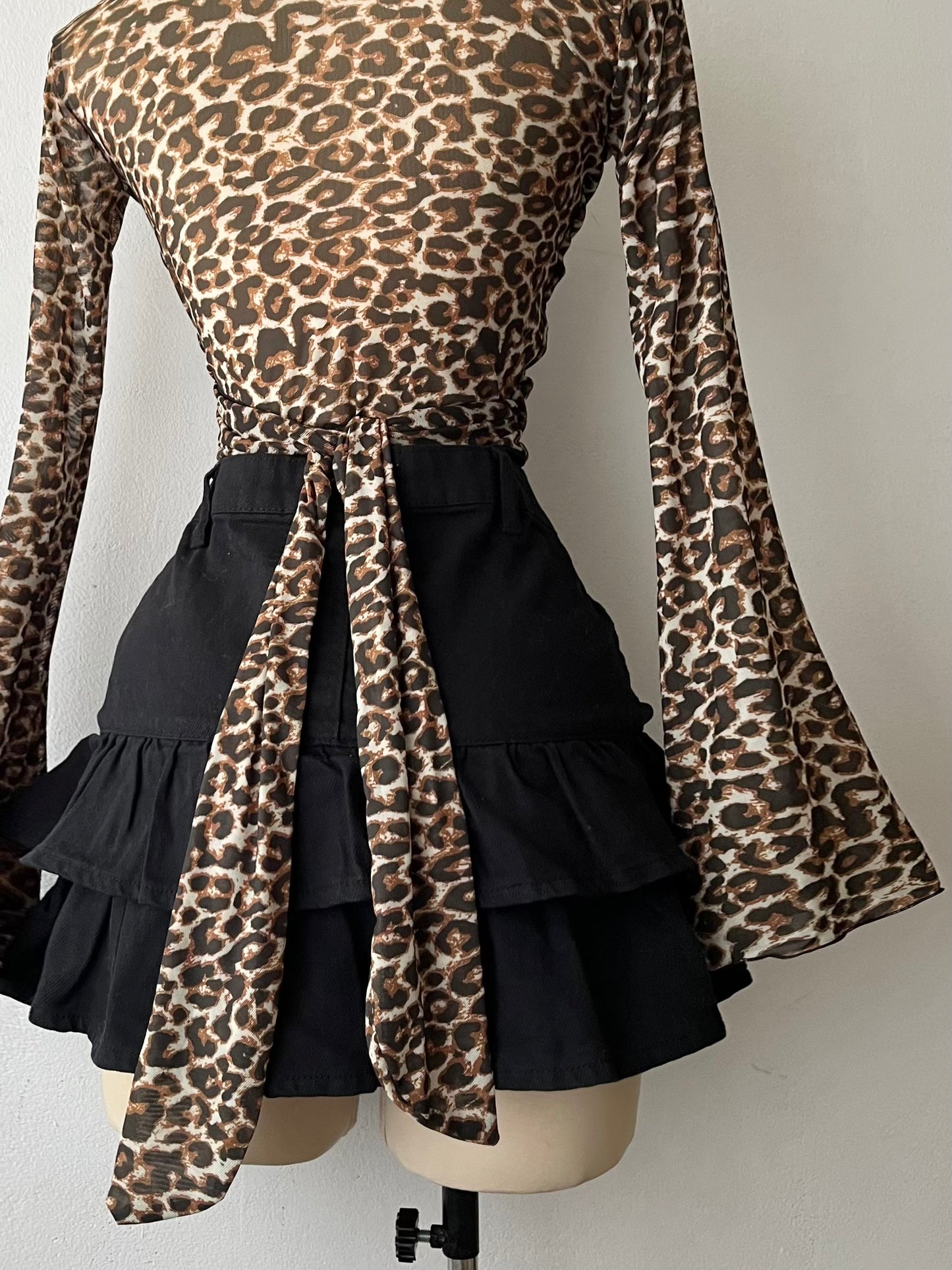 Animal print wrap-around blouse with flared sleeves
