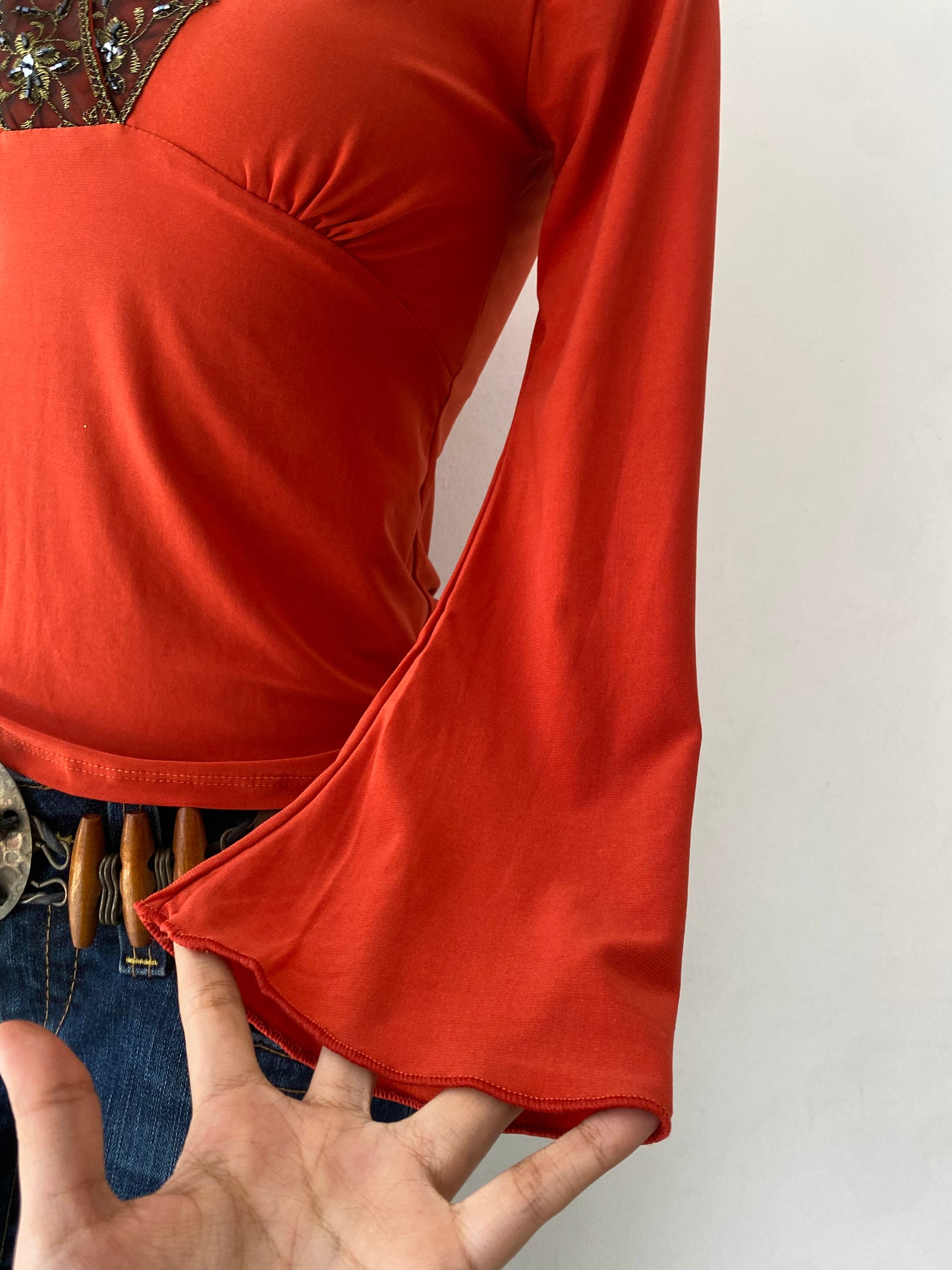 Bell-sleeved top