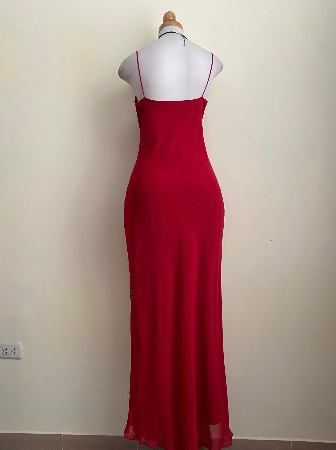 Red dress with silver appliqués