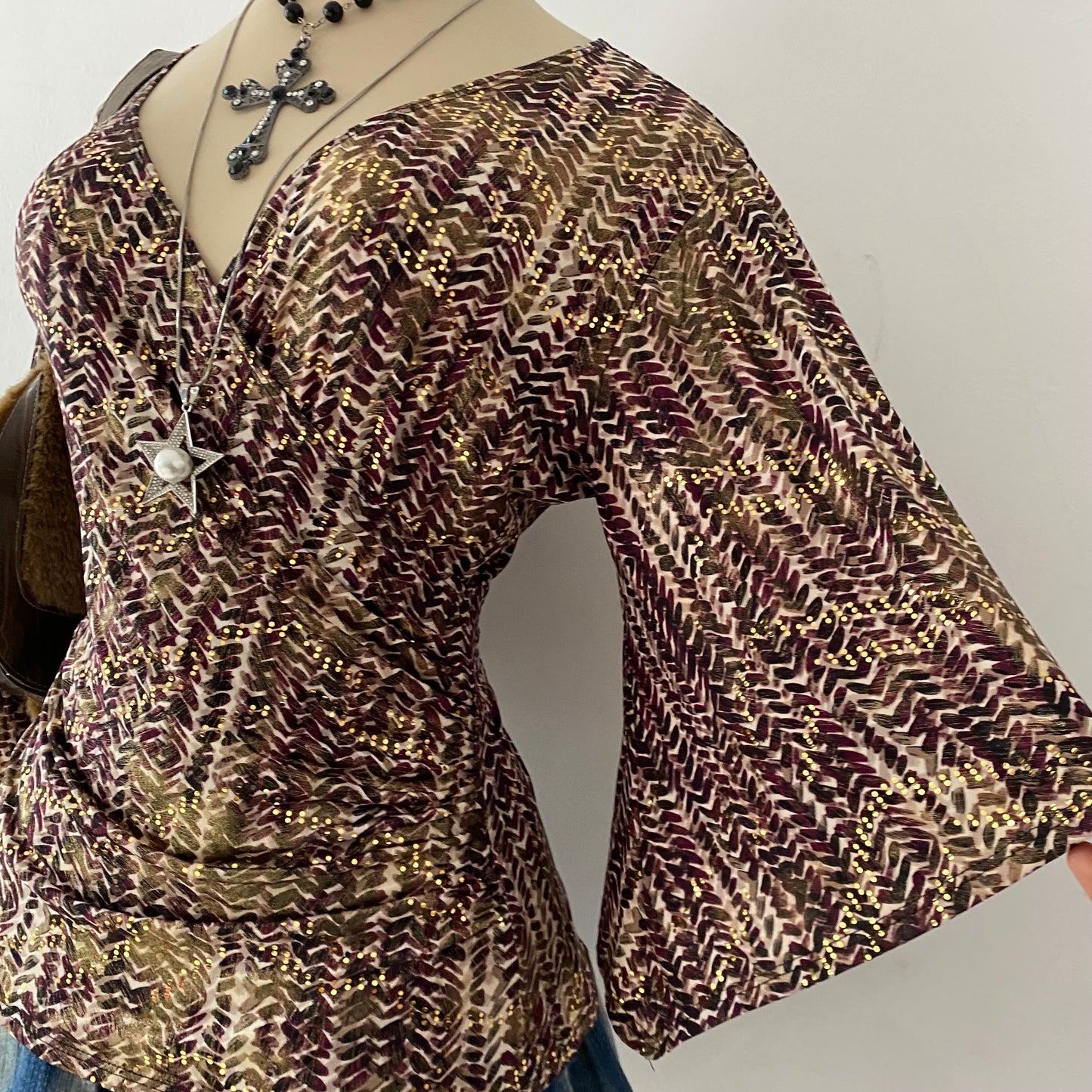 Iridescent crossover top