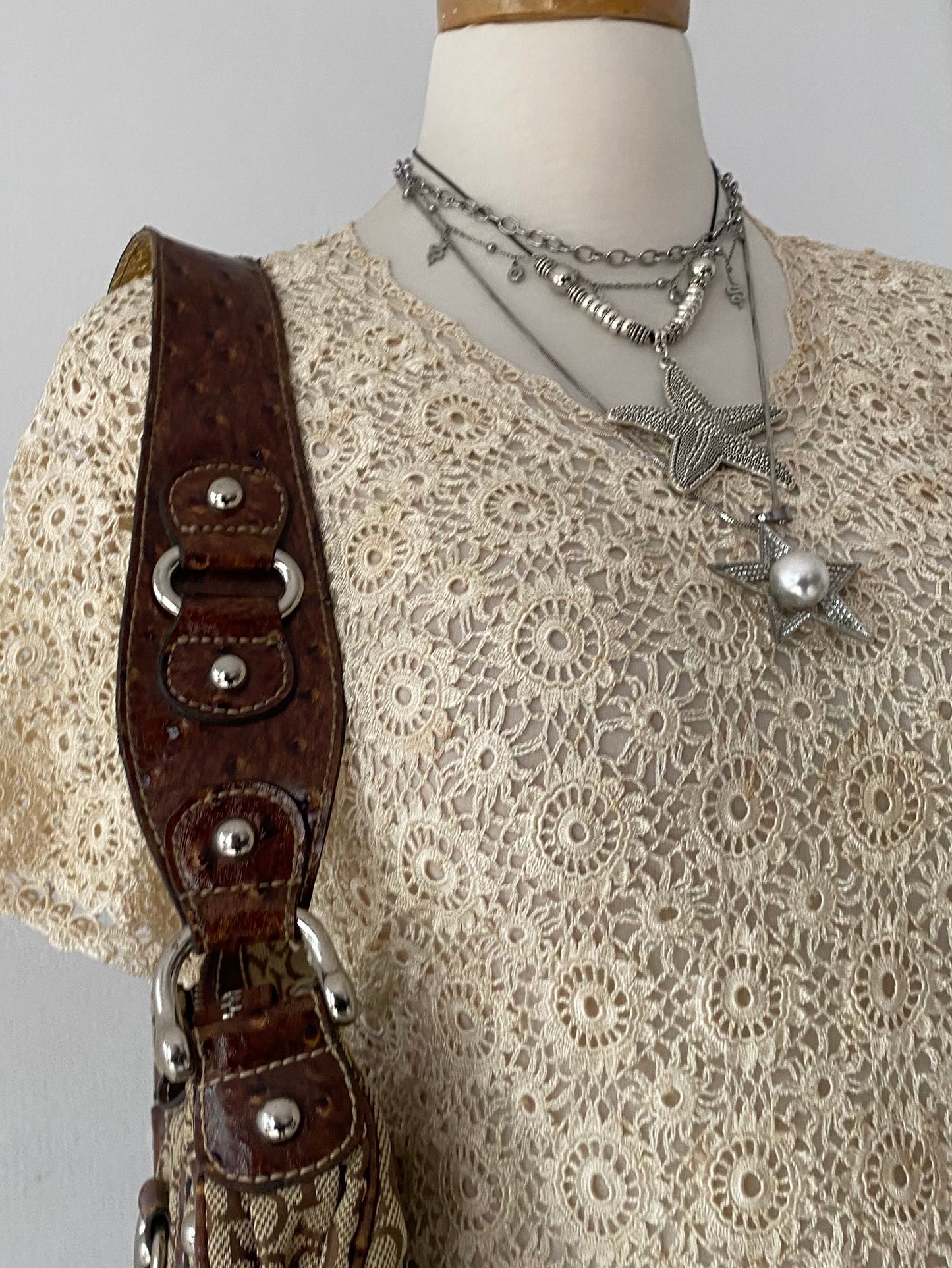 Knitted macrame top with back bow
