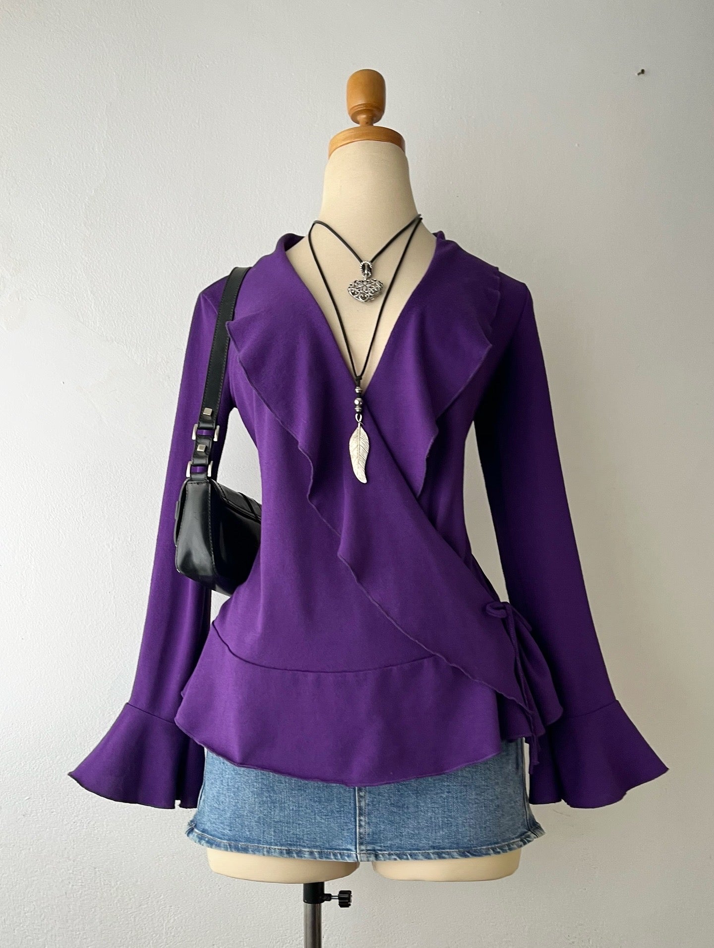 Purple wrap blouse with crossover design