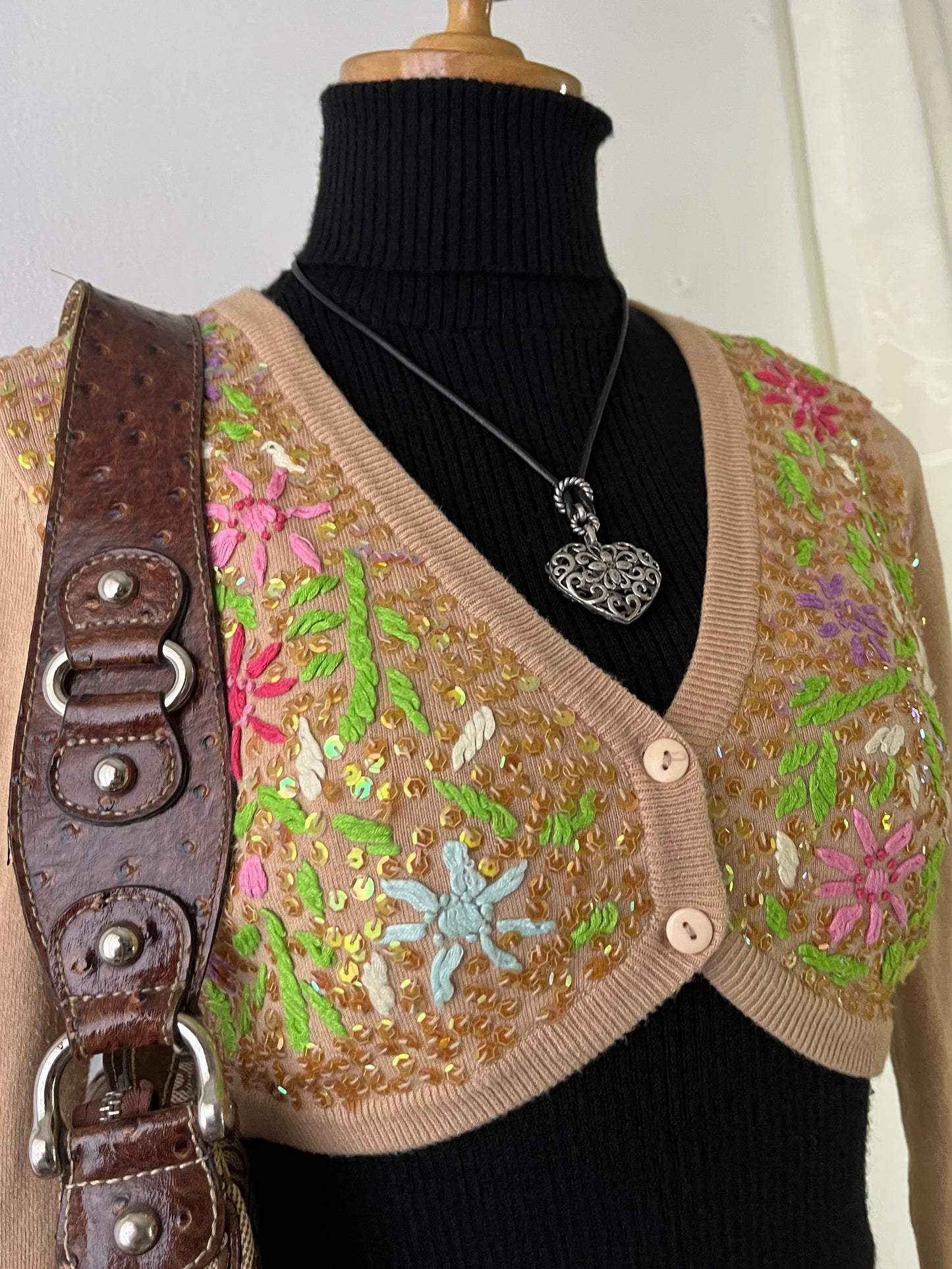 Beige knitted cardigan with hand embroidery