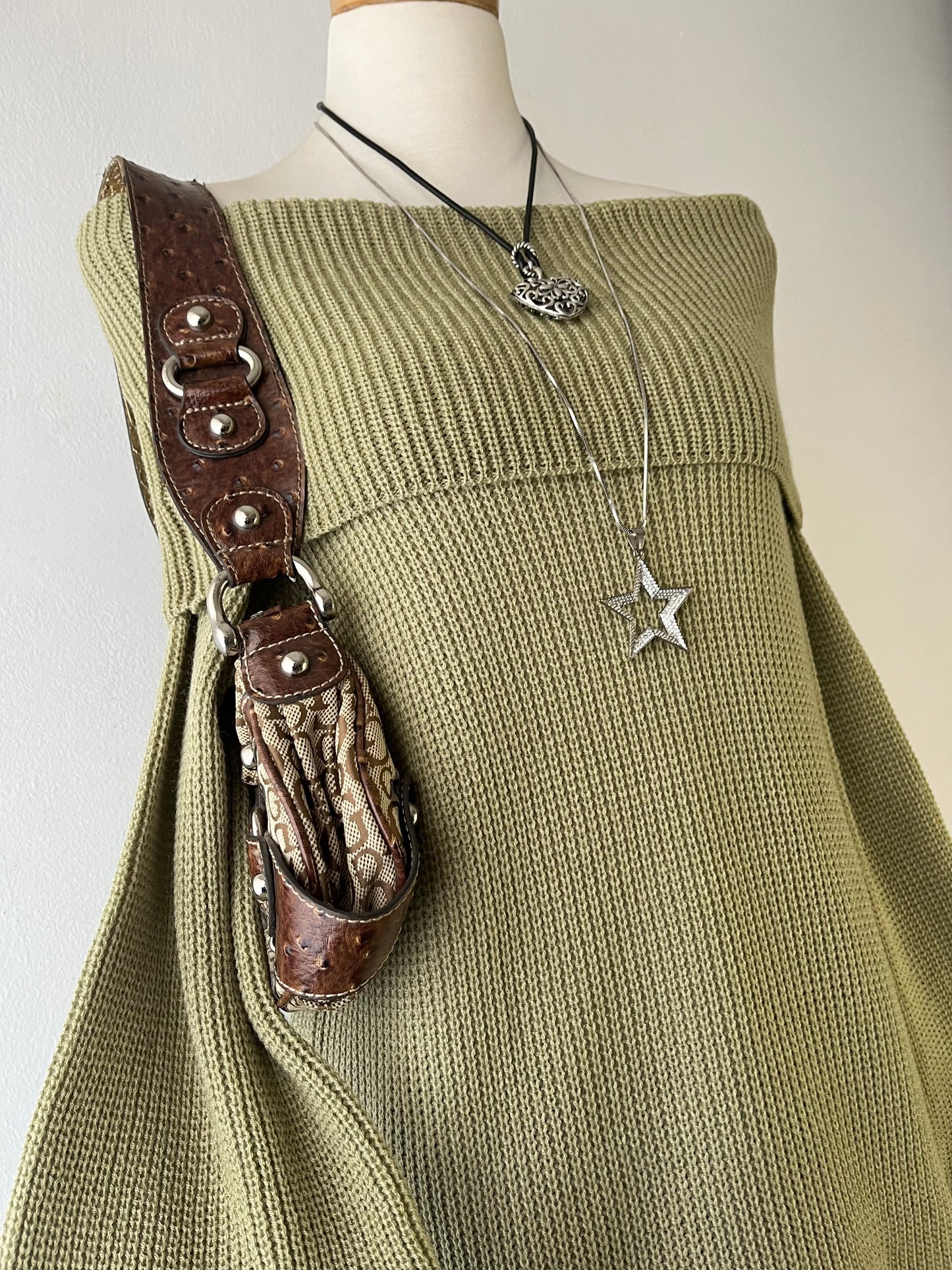 Oversized olive green sweater with flared sleeves