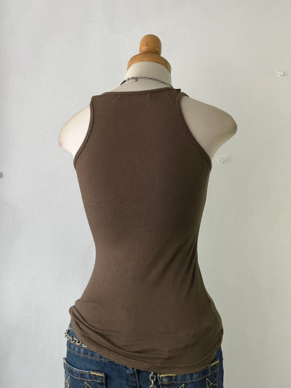 Top with embroidered butterfly design