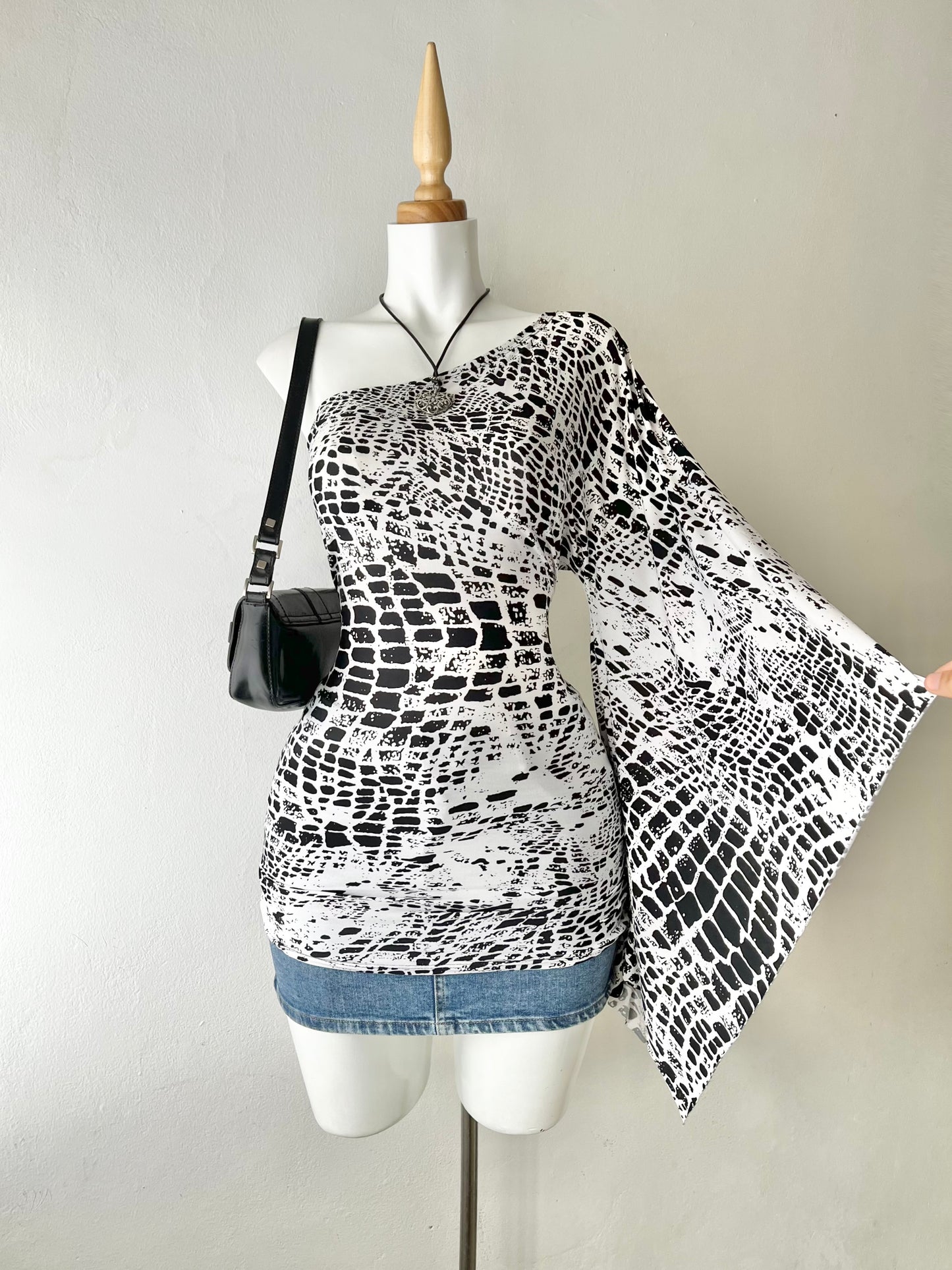 Iconic one-shoulder poly-dress