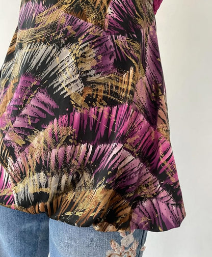 Fuchsia top with iridescent design