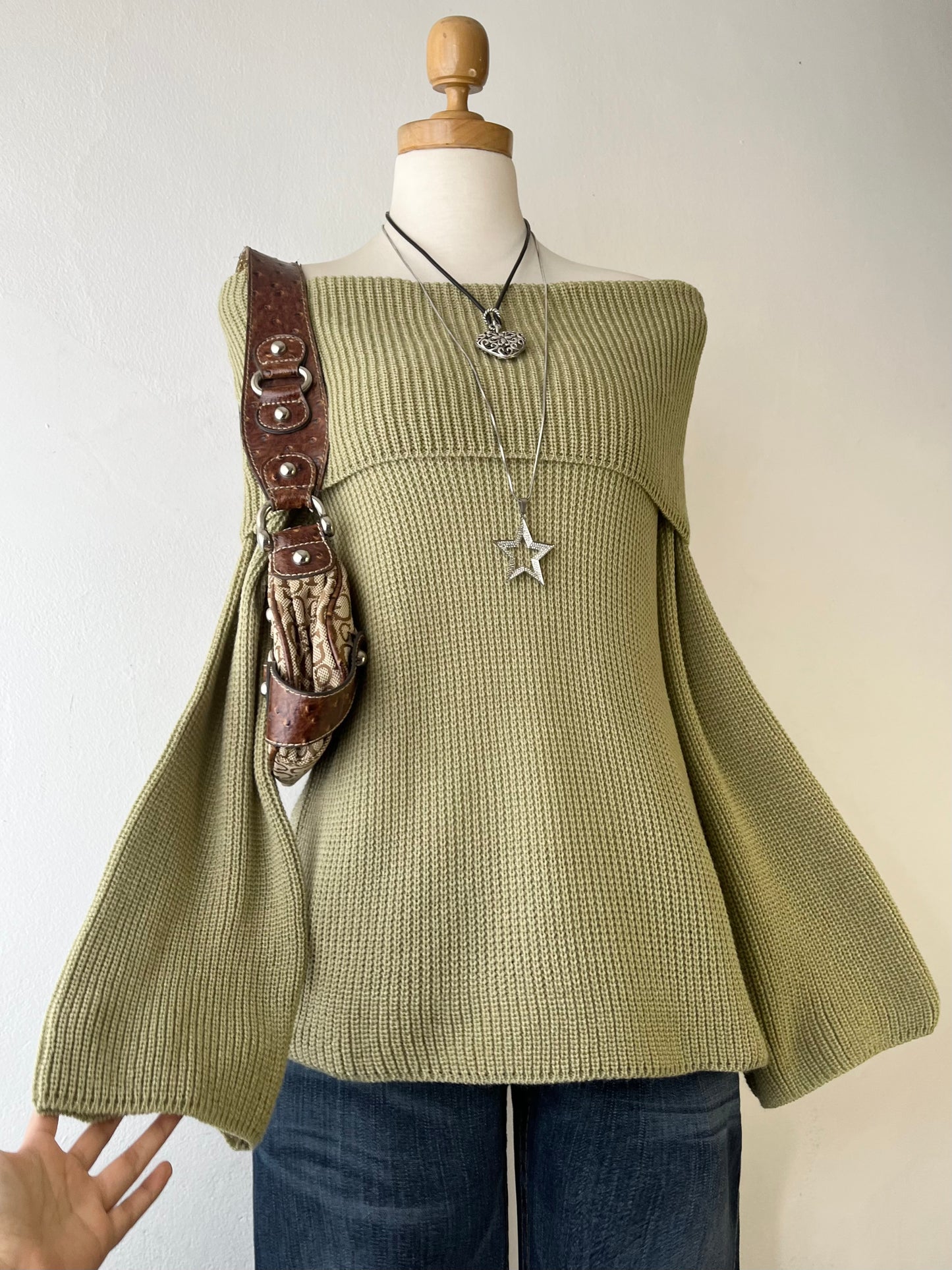 Oversized olive green sweater with flared sleeves