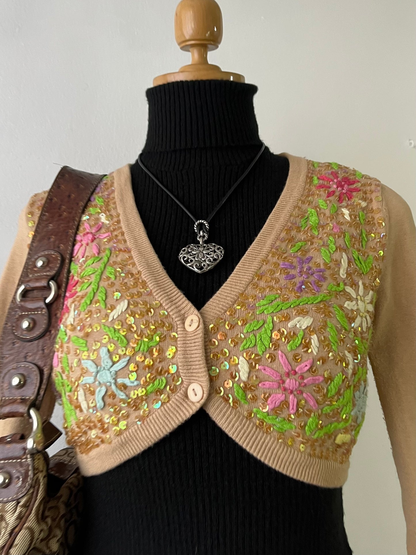 Beige knitted cardigan with hand embroidery