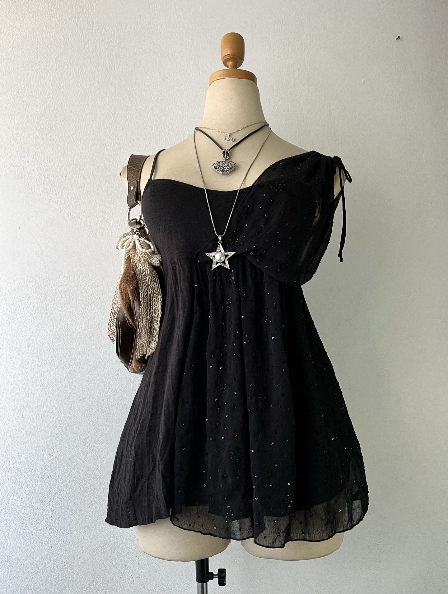 Adorable black top with sequins
