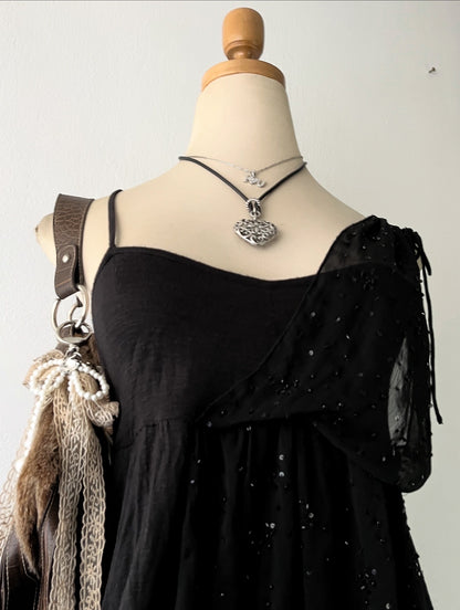 Adorable black top with sequins