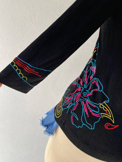 Top with orchid embroidery