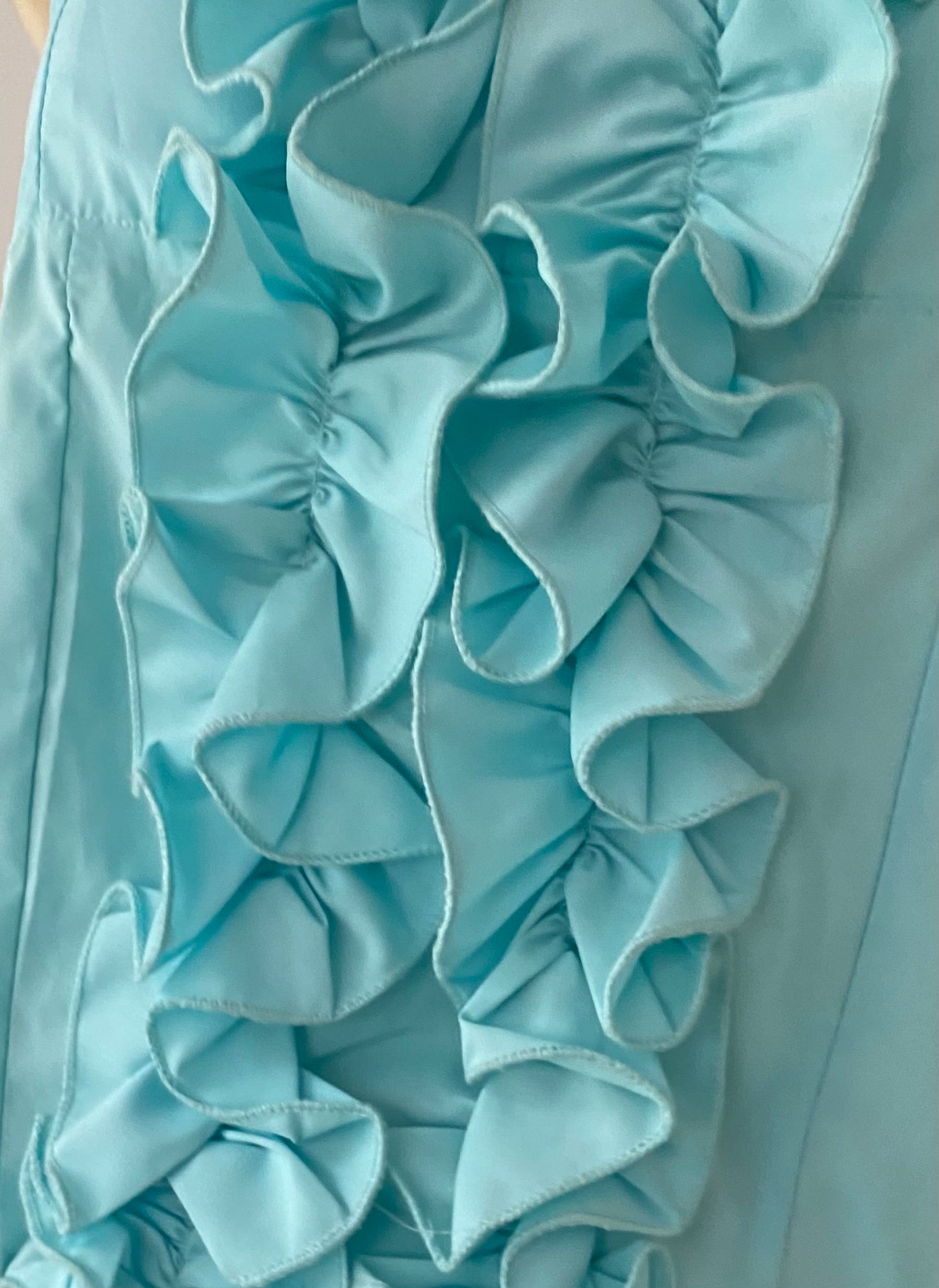 Light blue ruffled top-size M