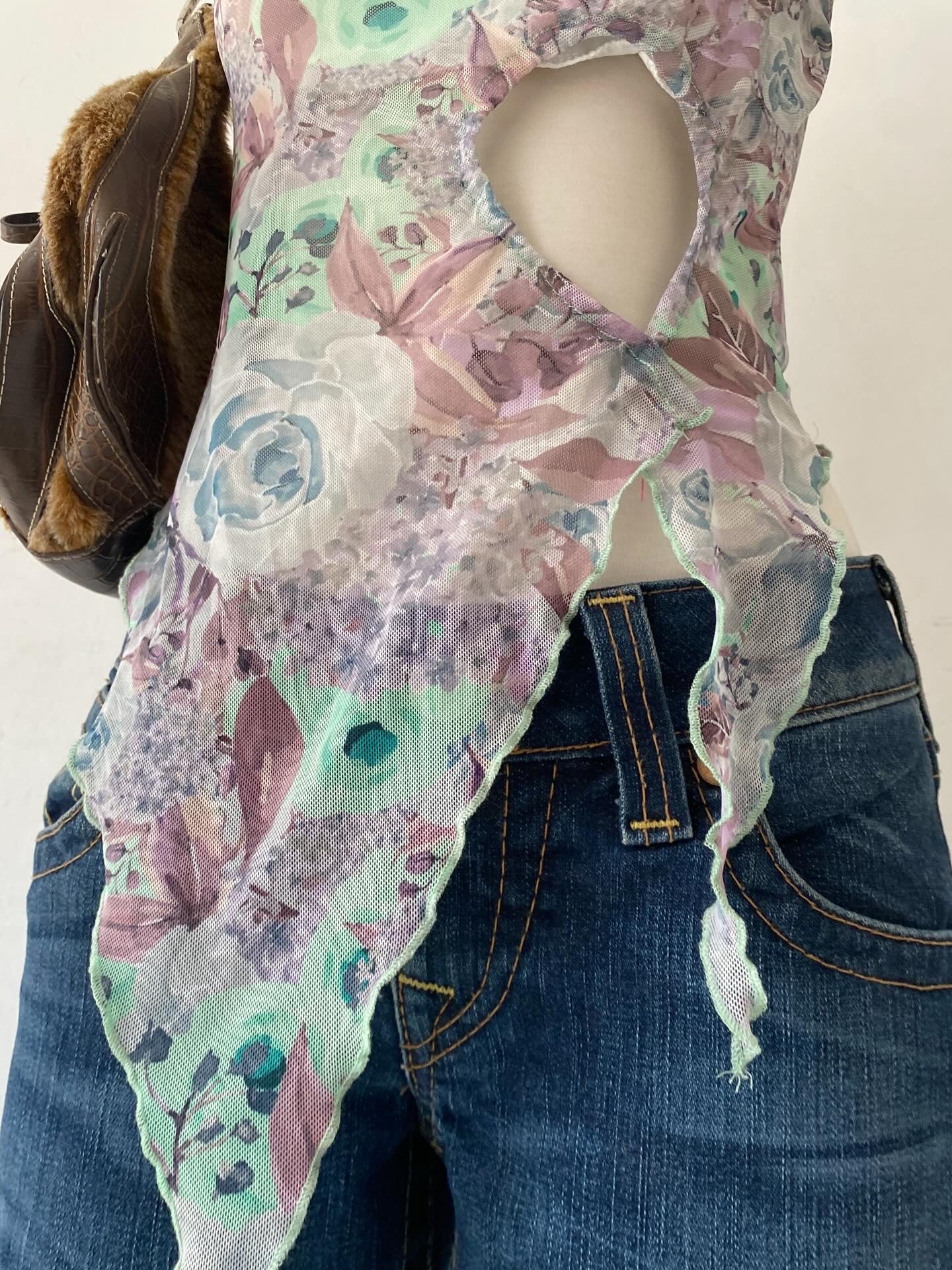 Asymmetrical fairy top