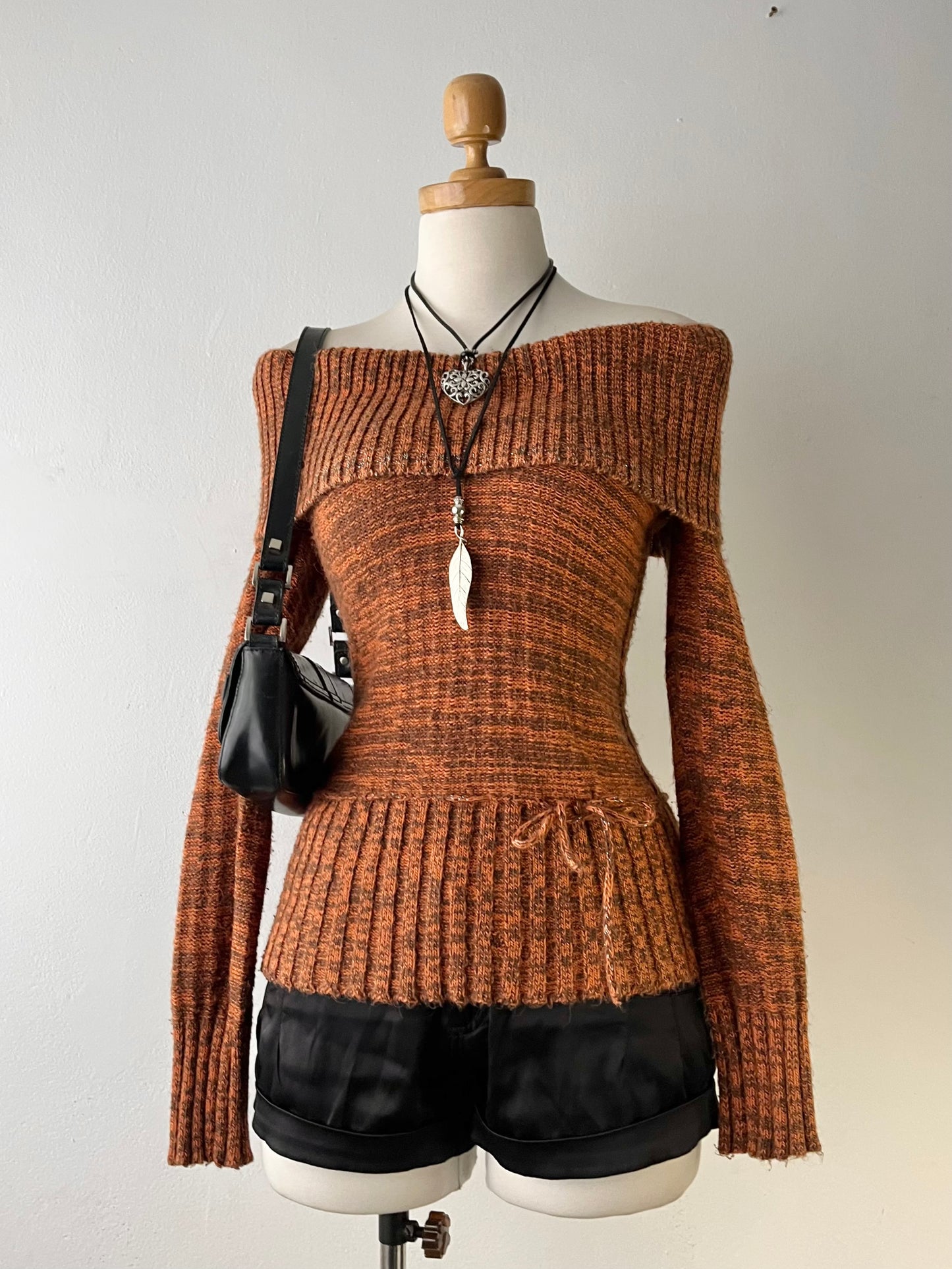 Off shoulder knitted sweater with bow