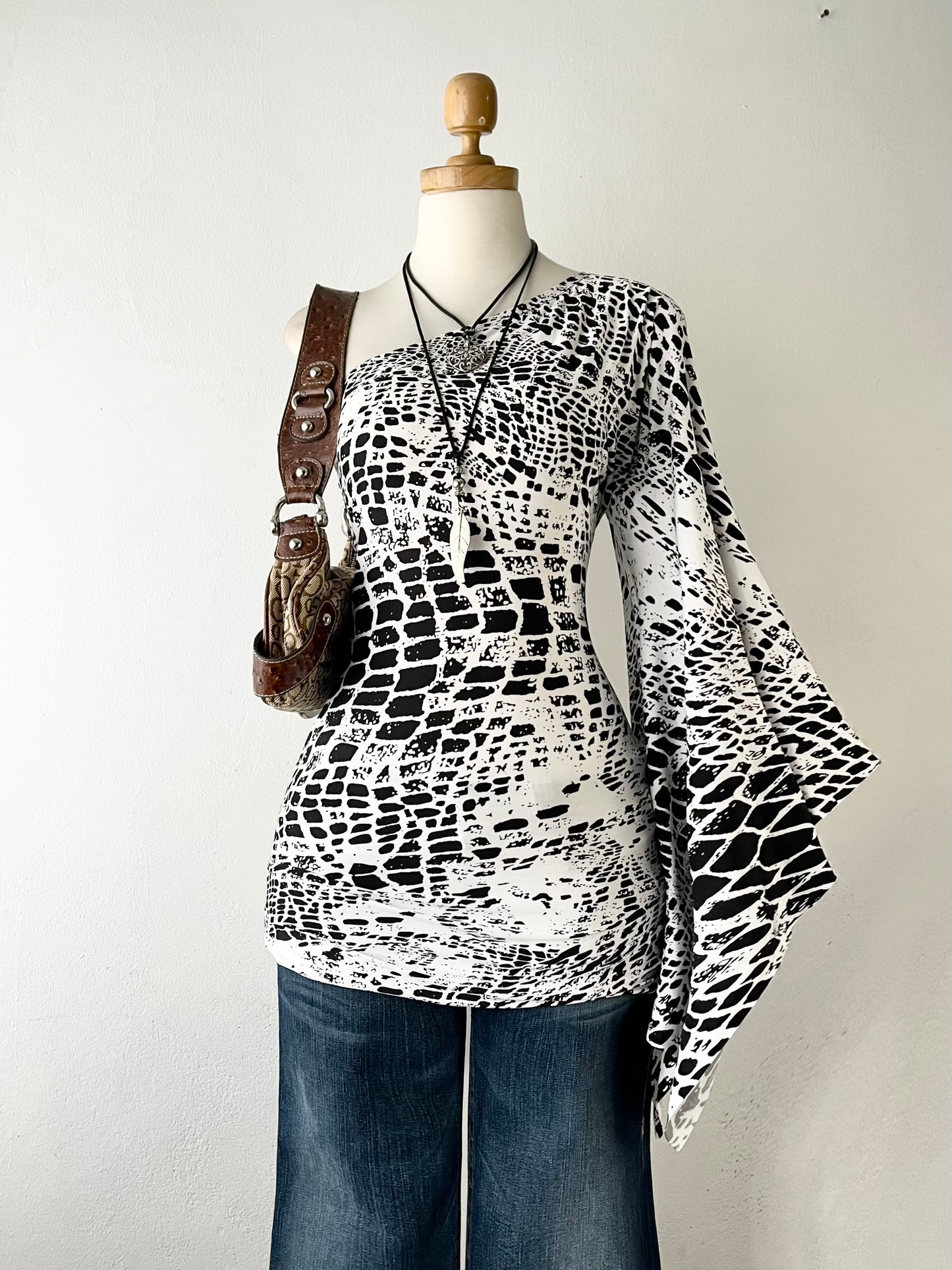 Super flared one-shoulder polydress