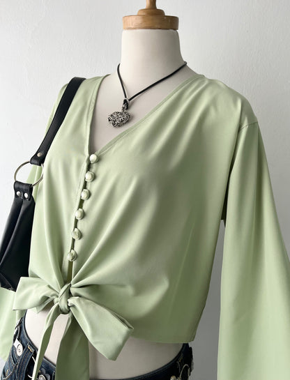 Olive green blouse with bow and wide sleeves