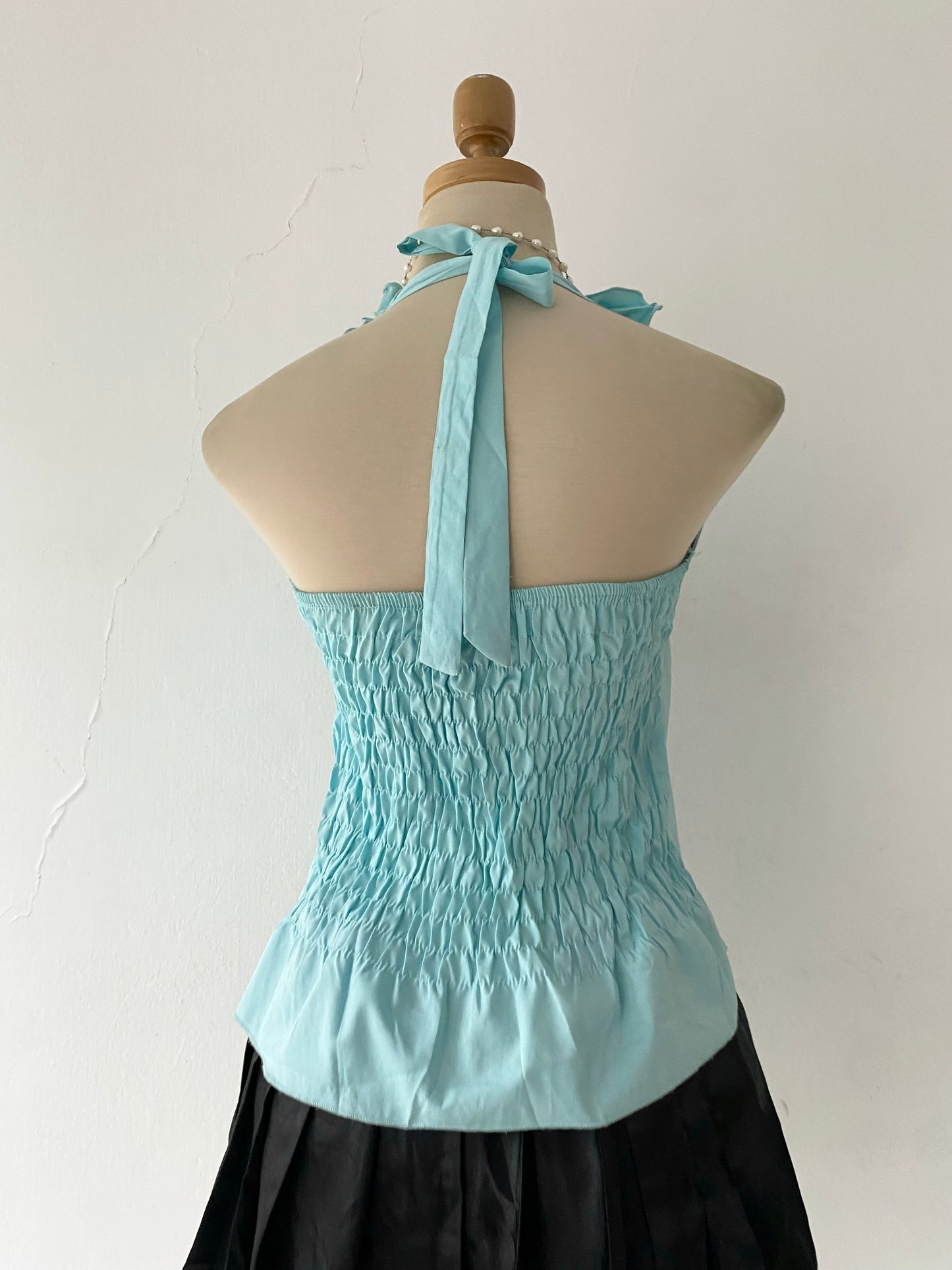 Light blue ruffled top-size M