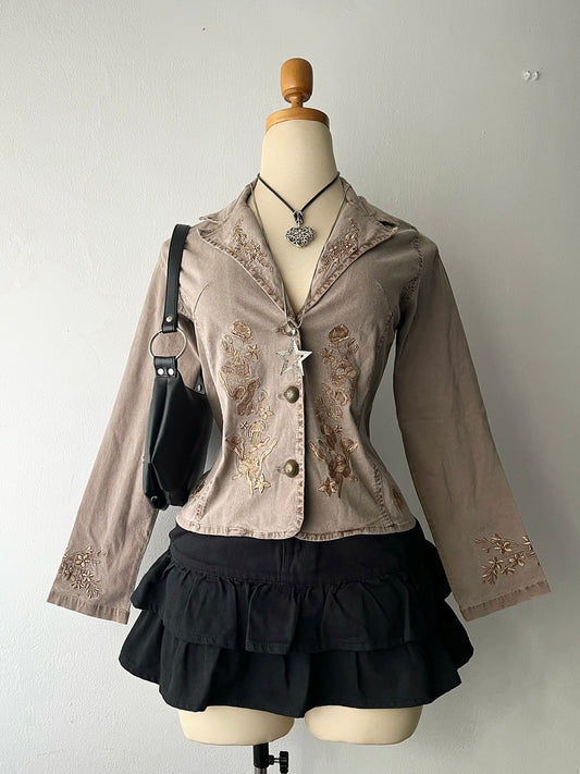 Beige jacket with embroidered designs