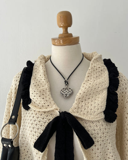 Knitted cardigan with bow