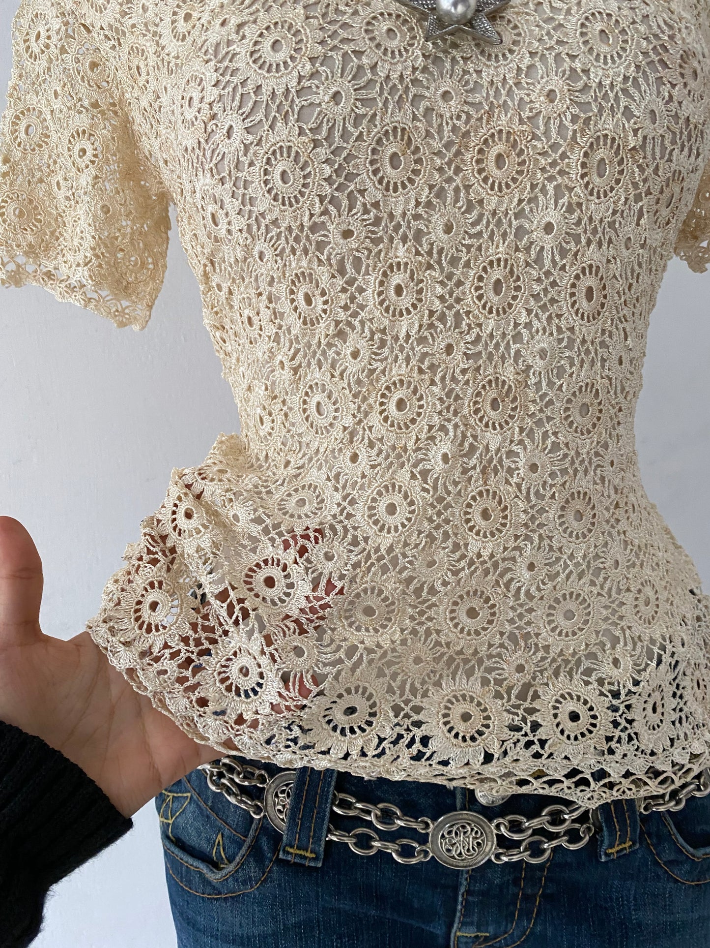 Knitted macrame top with back bow