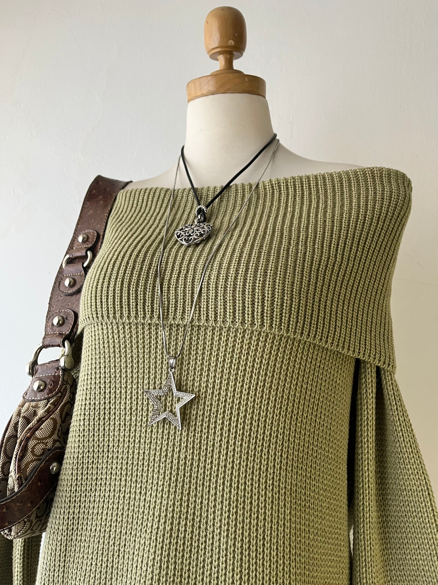 Oversized olive green sweater with flared sleeves