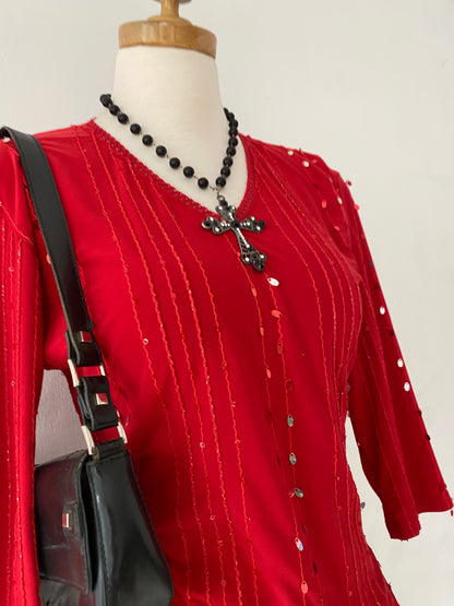 Red top with sequins
