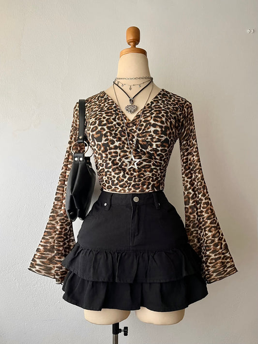 Animal print wrap-around blouse with flared sleeves