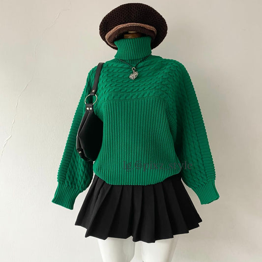 Oversized sweater with braided design