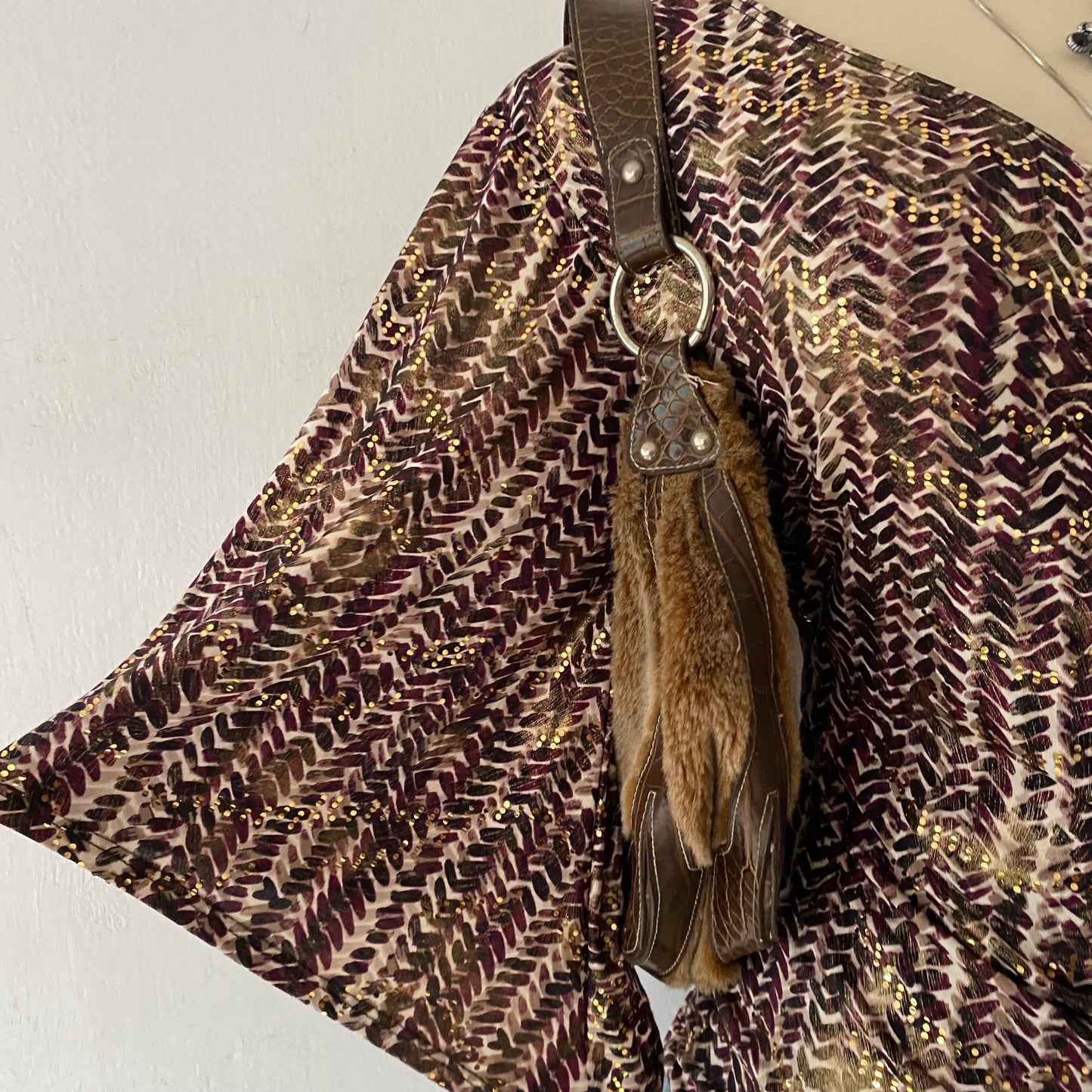 Iridescent crossover top