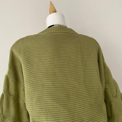 Waist-high sweater with braided design