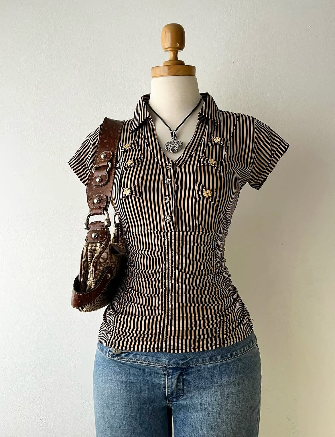 Striped blouse with bows