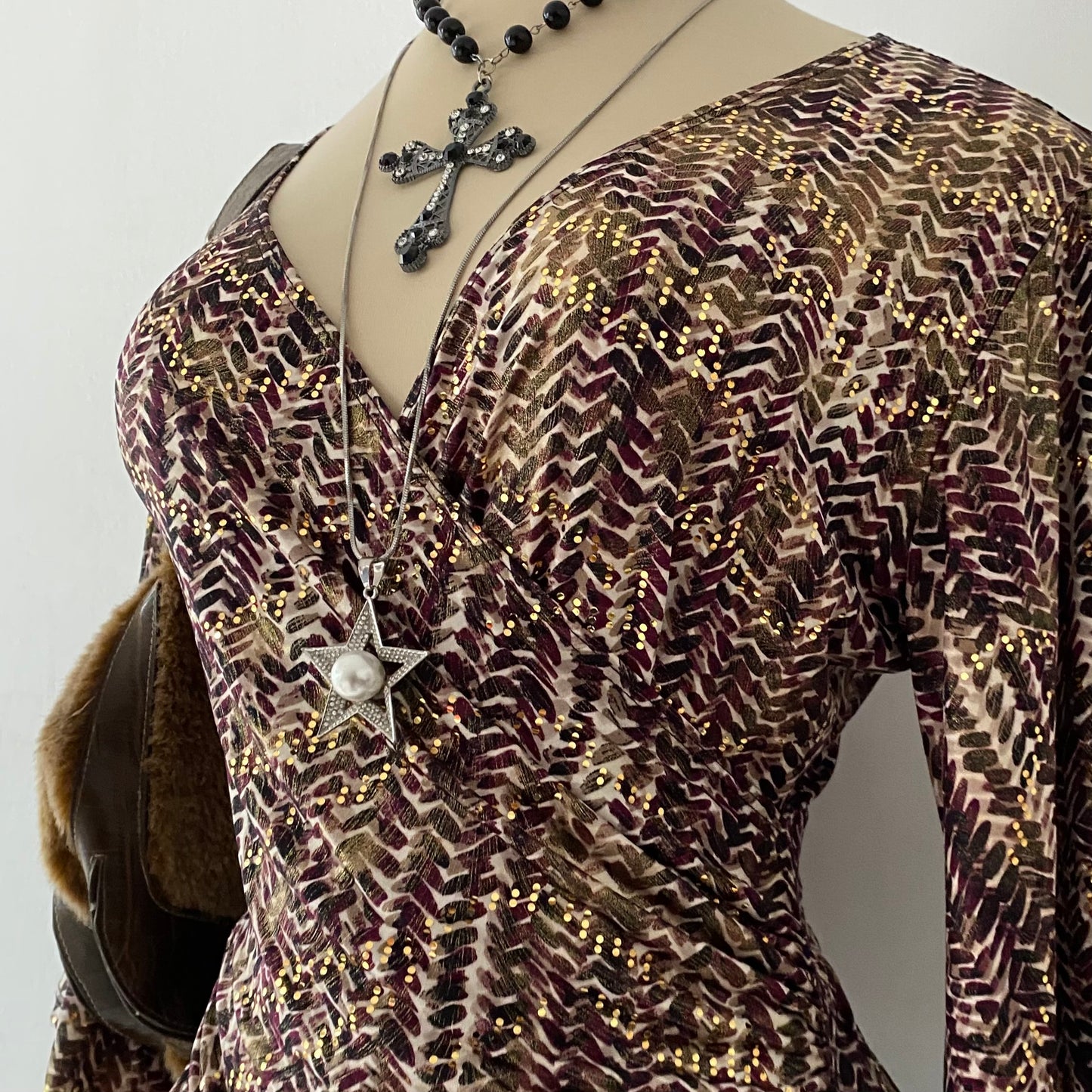 Iridescent crossover top