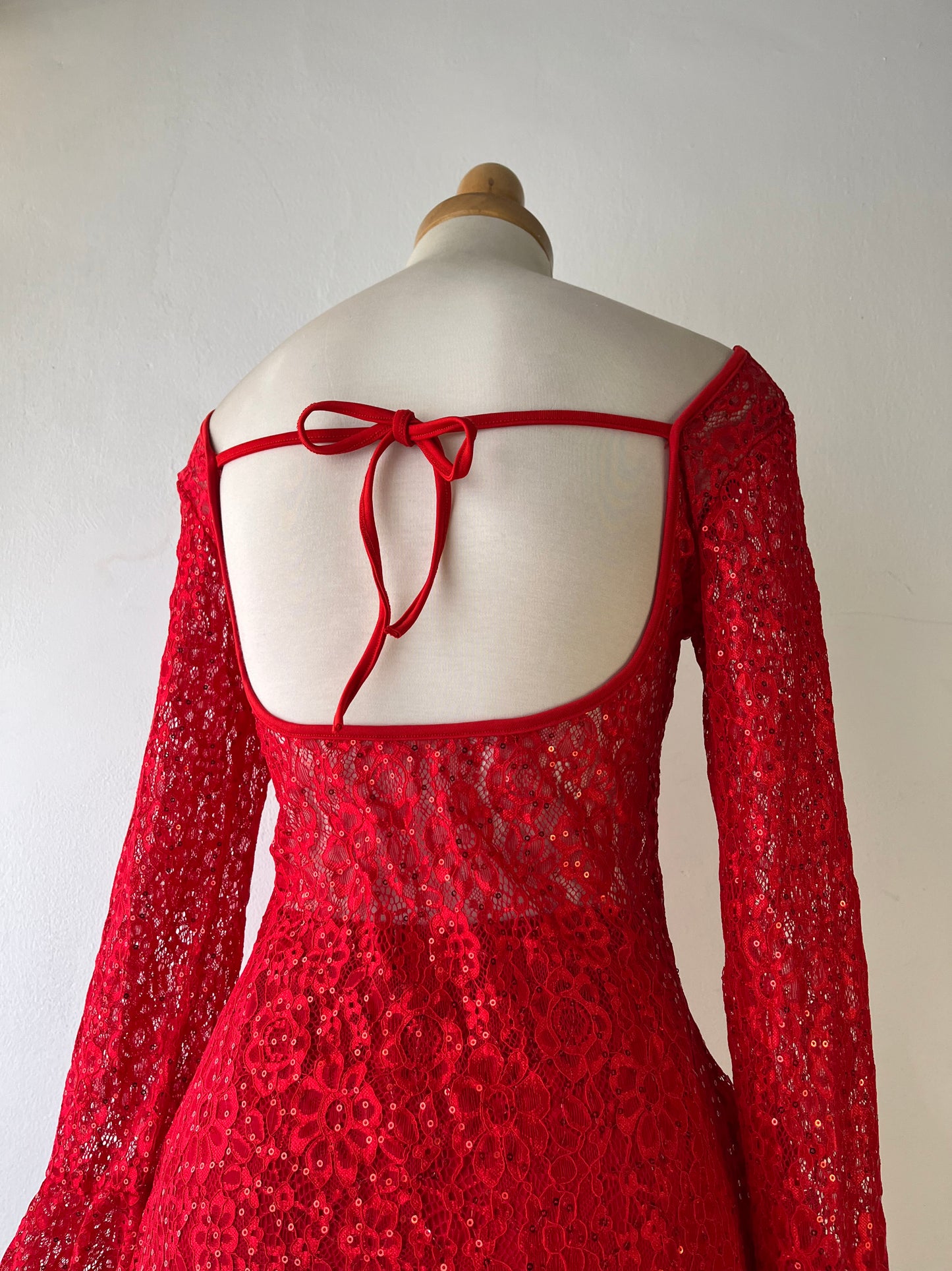 Red lace dress with flared sleeves