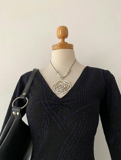 Bell-sleeved top