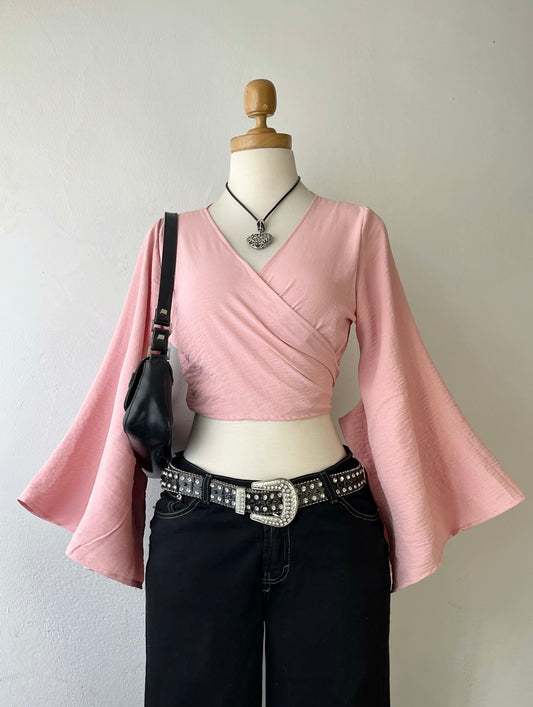 Pale pink top with wide sleeves