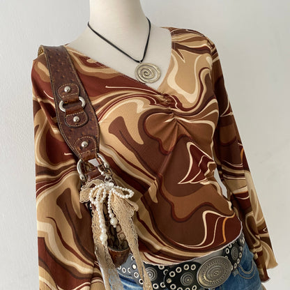 Bell-sleveed top