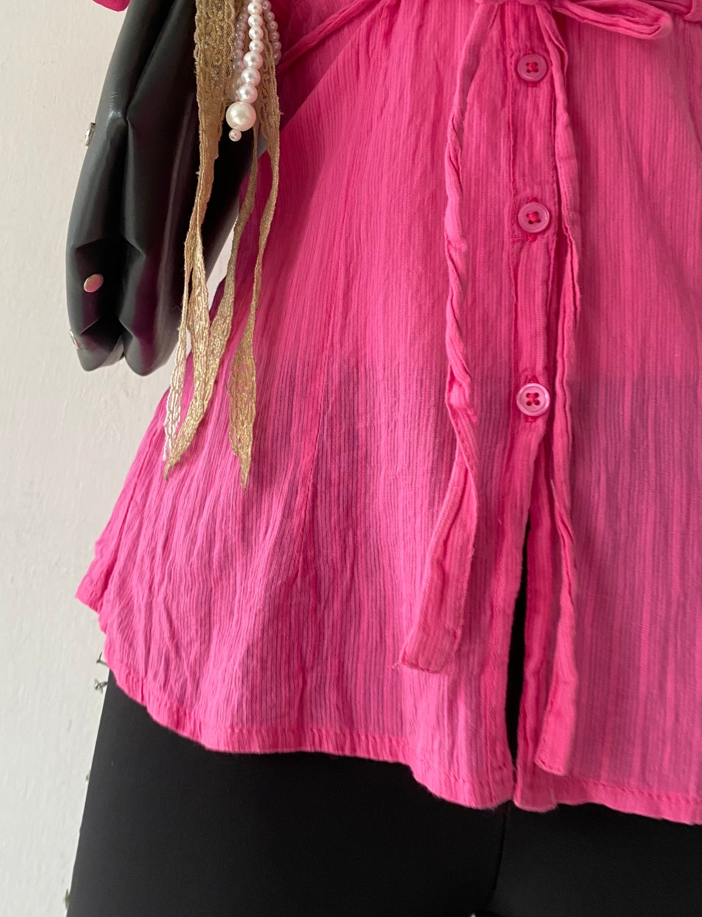 Pink top with bow