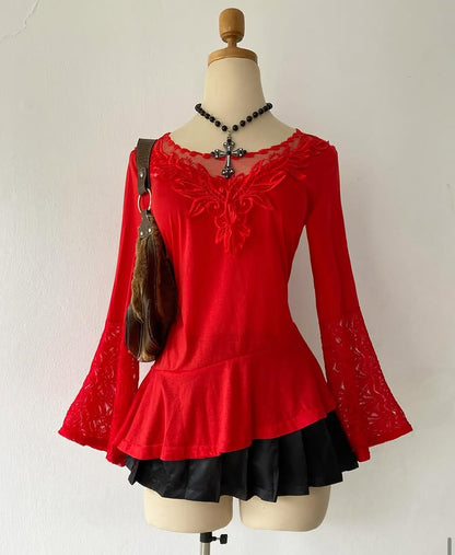 Bell-sleeved red top