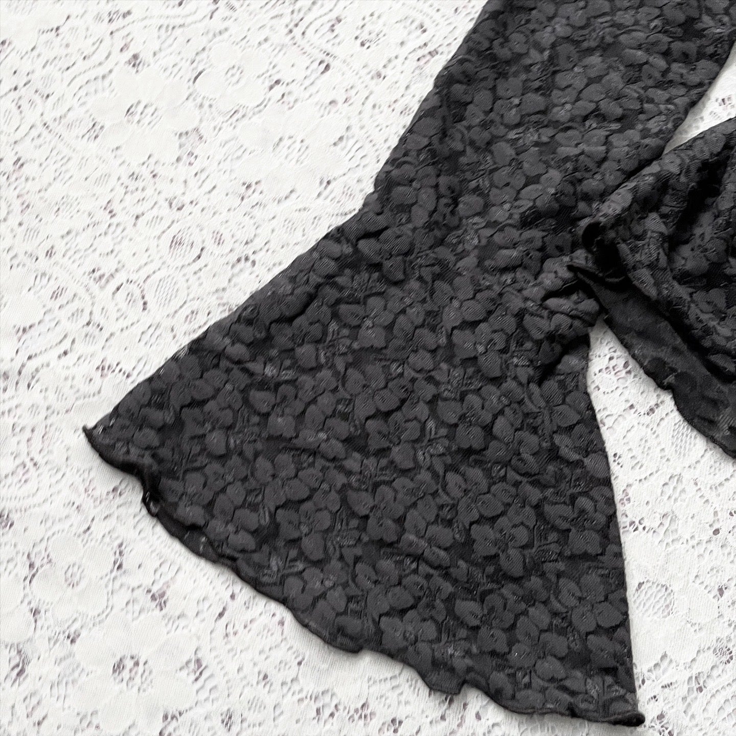 Bell-sleveed lace top