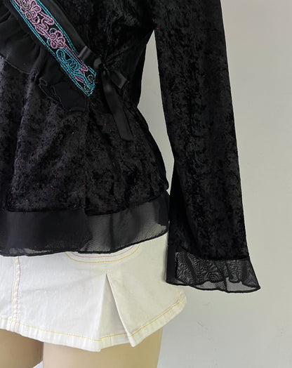 Wrap blouse with embroidered designs