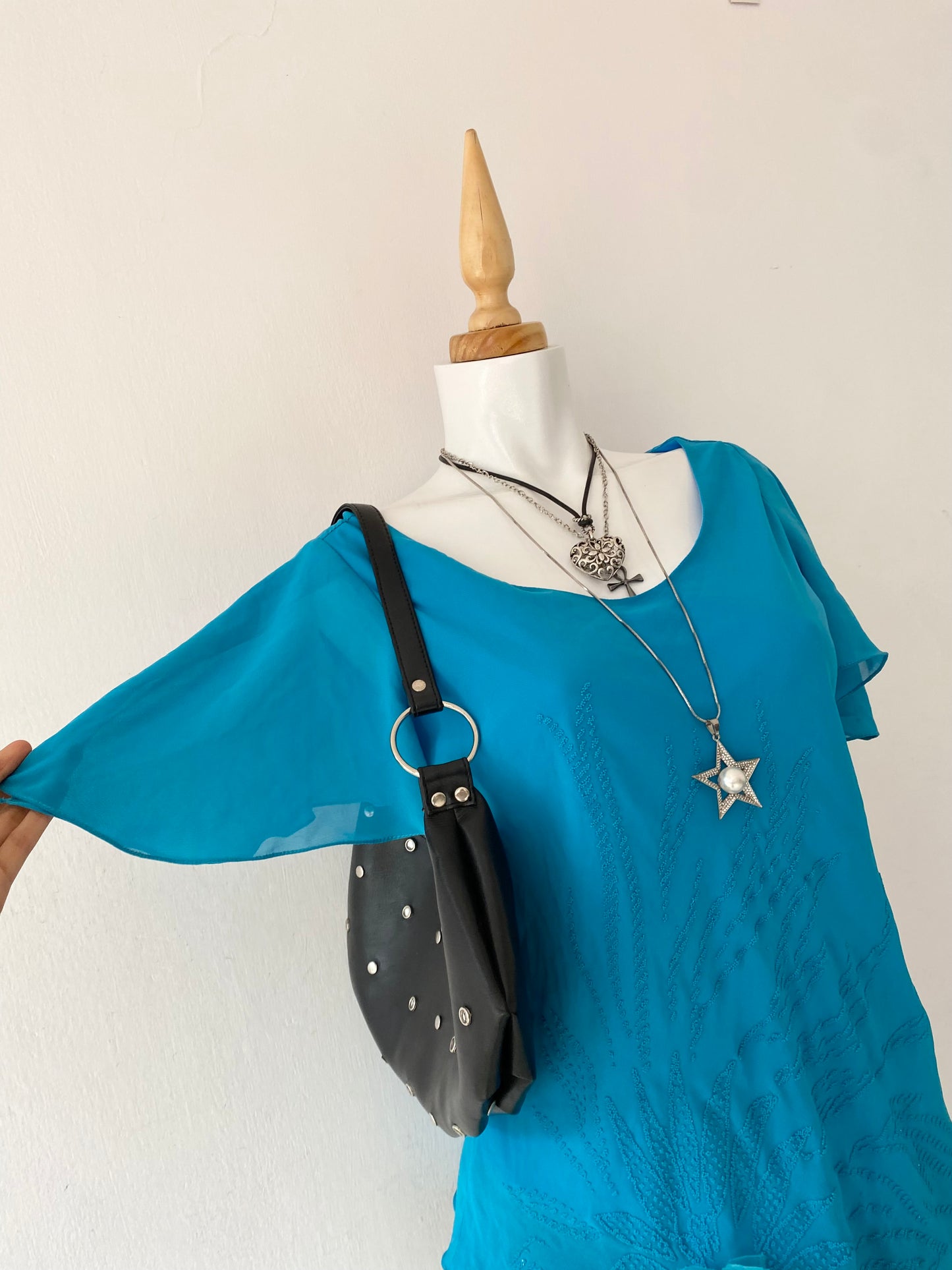 Light blue asymmetrical blouse