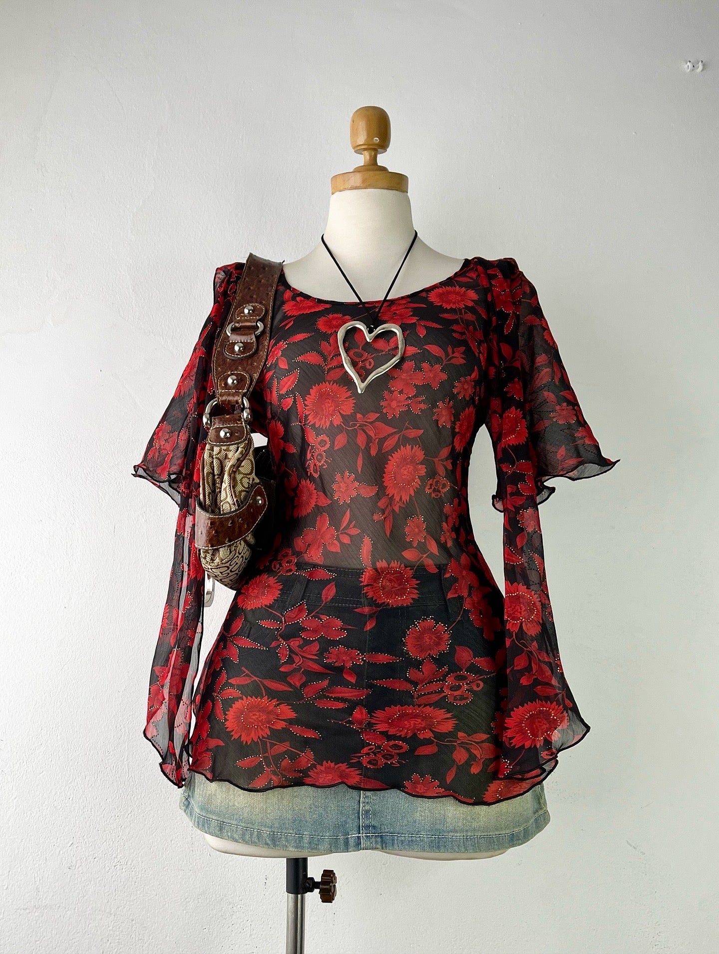 Floral blouse with hanging bows