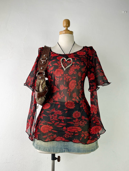 Floral blouse with hanging bows