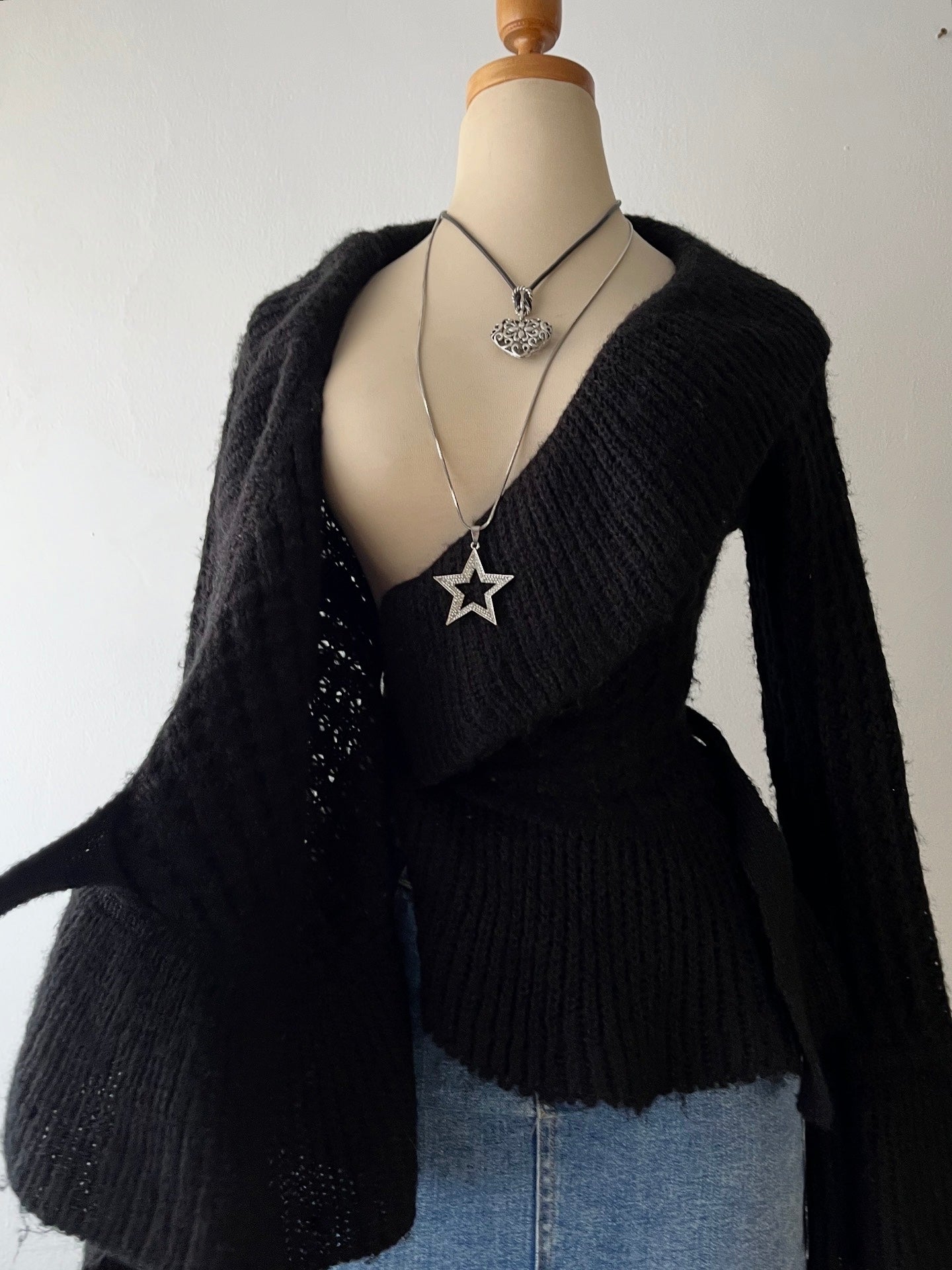 Wool cardigan with bow and flared sleeves